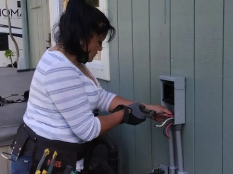 Licensed electrician wiring an exterior subpanel in Colebrookdale